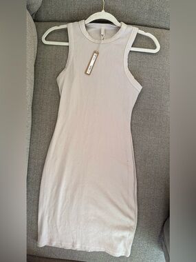 SKIMS Sleeveless Ribbed Tank Dress in Light Beige